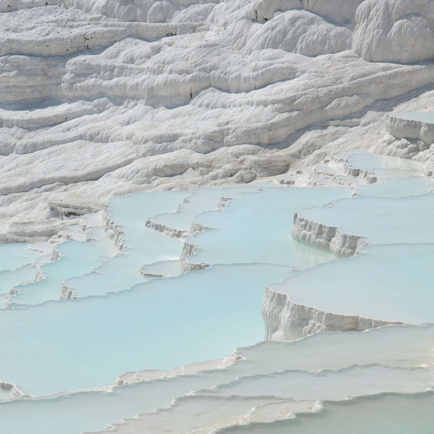 a large body of water surrounded by mountains