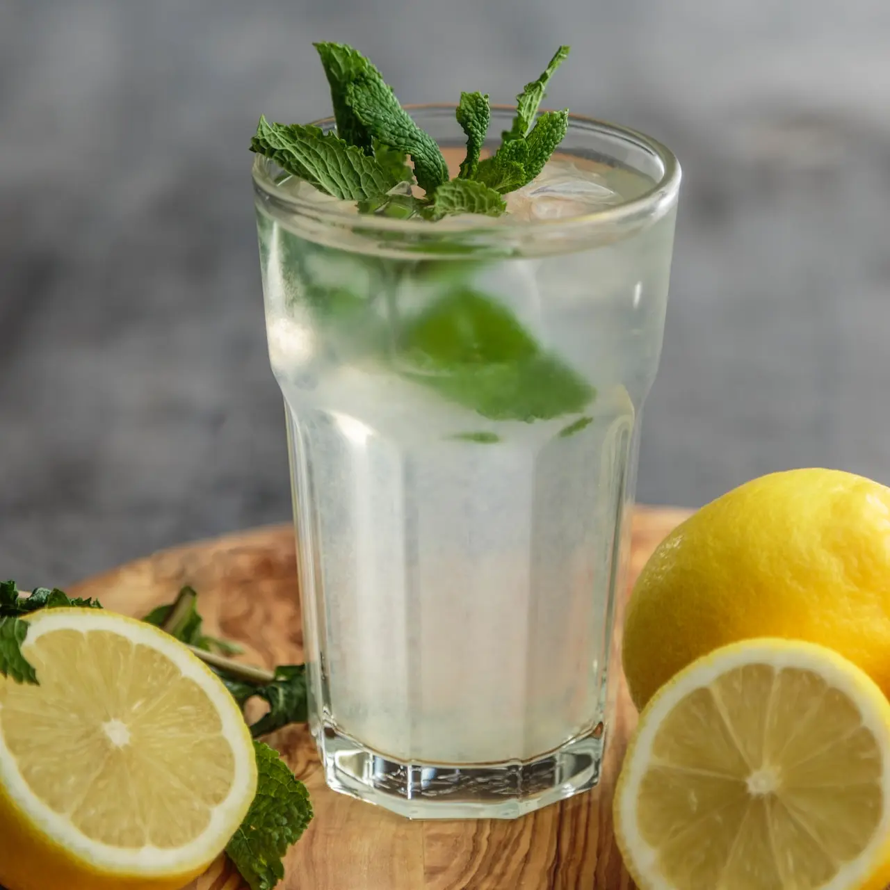 lime juice on drinking glass beside sliced limes